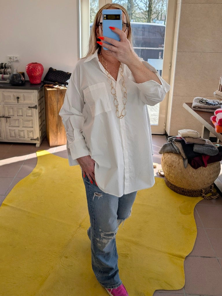 Erwecken Sie Ihren inneren Pariser Chic mit der Bluse von Drole de Copine Paris aus 100% Baumwolle. Verleihen Sie Ihrem Look das gewisse Etwas!