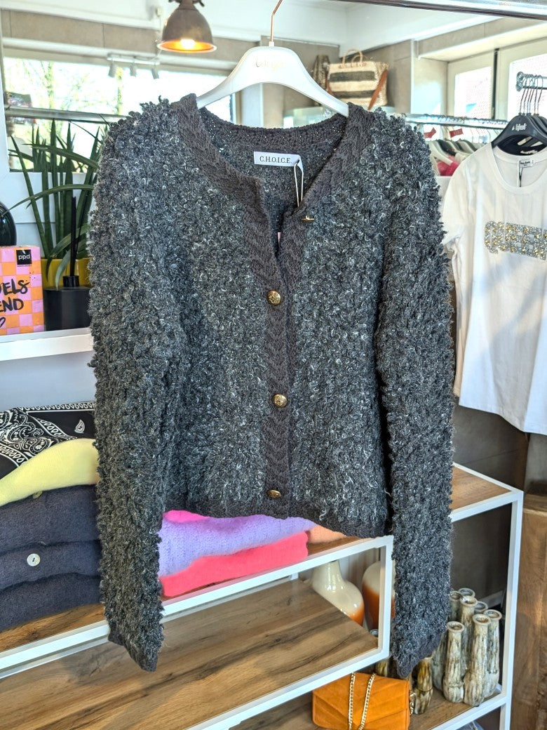 Der elegante Bouclé-Cardigan in dezenten Grautönen verbindet Nylon mit feiner Alpaka- und Wollfaser zu einem besonders weichen und wärmenden Tragegefühl!