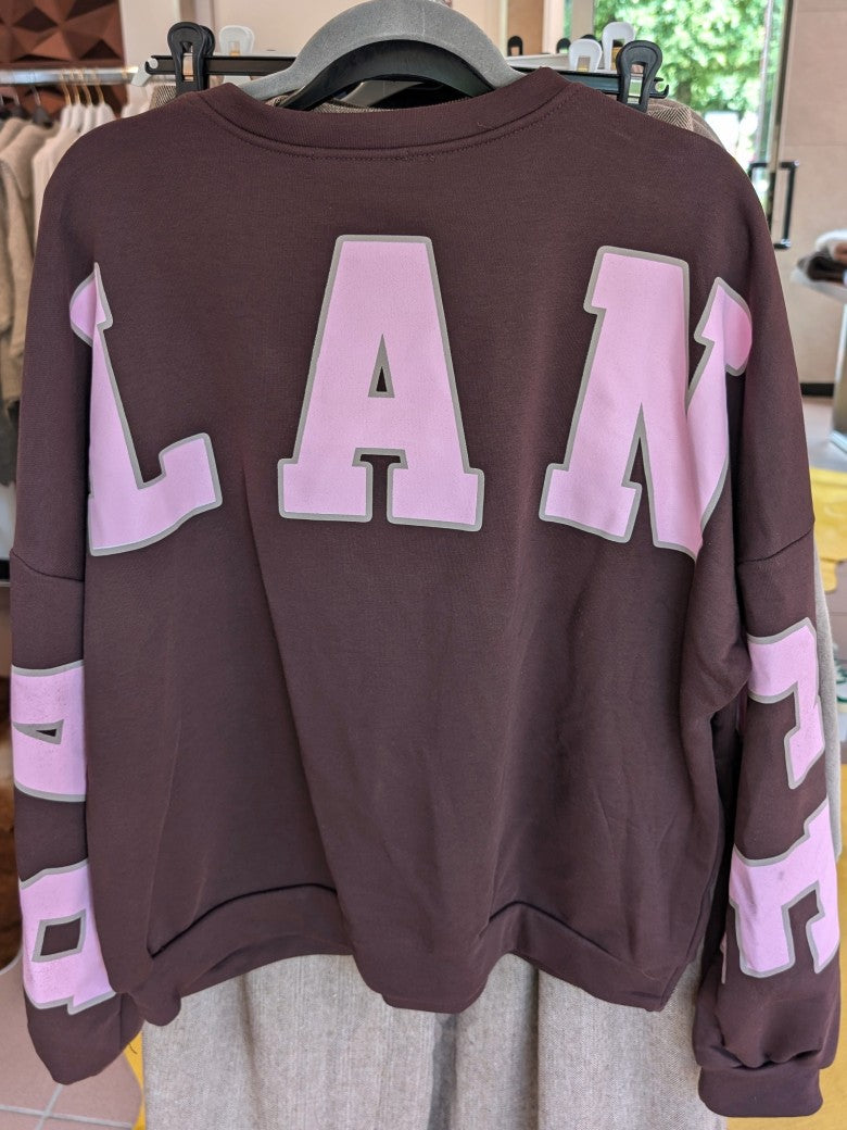 Das Sweatshirt BALANCE OM Yoga von BELIEVE in den harmonischen Farben Coffee Braun und Pink Taupe ist ideal für entspannte Momente. Setze modische Akzente!