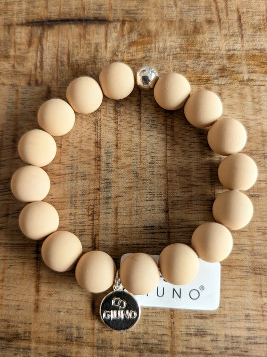 Zeigen Sie Ihre Persönlichkeit mit unserem großartigen elastischem Armband mit mittelgroßen Perlen aus Acryl und Kupfer in warmen Beige - holen Sie es sich jetzt!