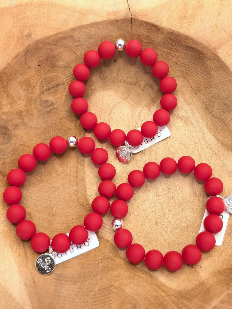 Zeigen Sie Ihre Persönlichkeit mit unserem großartigen elastische Armband mit mittelgroßen Perlen aus Acryl und Kupfer in Rot Matt - holen Sie es sich jetzt!