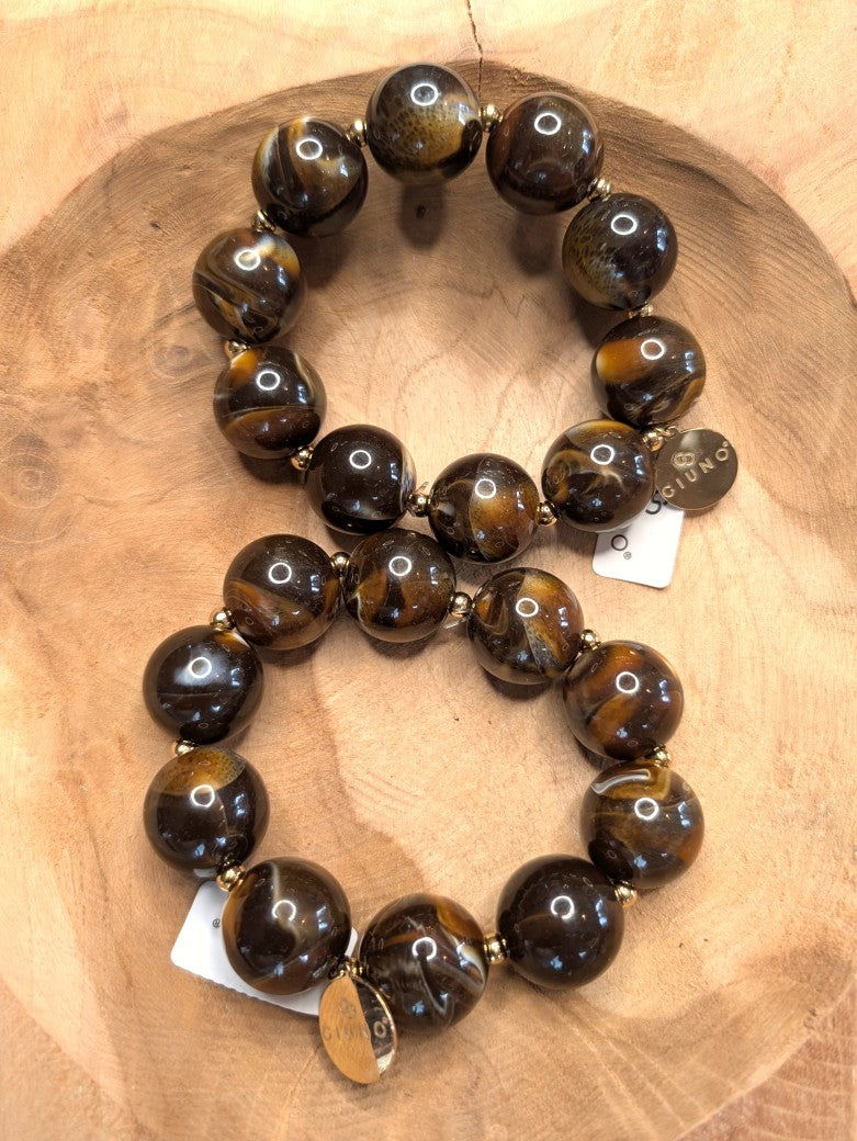Zeigen Sie Ihre Persönlichkeit mit unserem großartigen elastischem Armband mit dicken Perlen aus Acryl und Kupfer in Perlmutt Coffee Braun Gold!