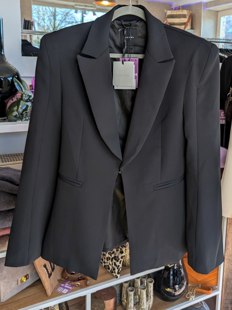 Hochwertige schwarze Wide Leg Anzughose in Größe L von Lumina – perfekte für professionelle Eleganz. Ideal für Büro, wichtige Termine und formelle Anlässe!