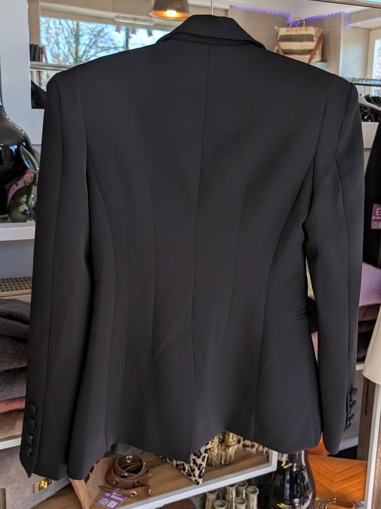 Hochwertige schwarze Wide Leg Anzughose in Größe L von Lumina – perfekte für professionelle Eleganz. Ideal für Büro, wichtige Termine und formelle Anlässe!