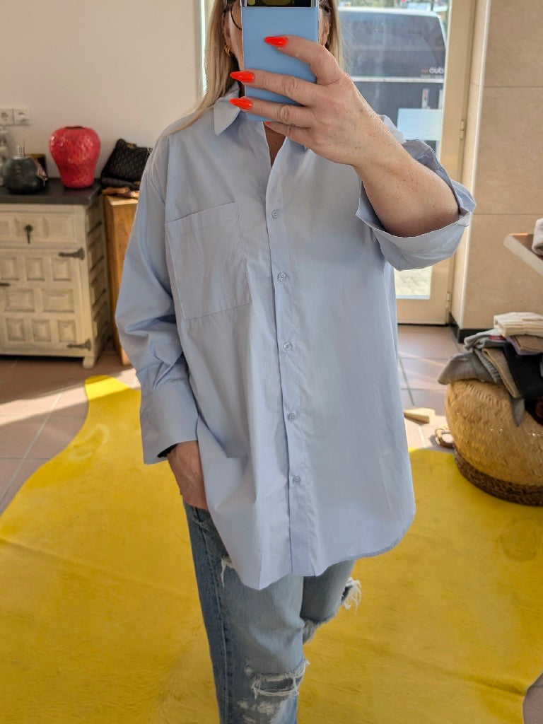 Erwecken Sie Ihren inneren Pariser Chic mit der Bluse von Drole de Copine Paris aus 100% Baumwolle. Verleihen Sie Ihrem Look das gewisse Etwas!