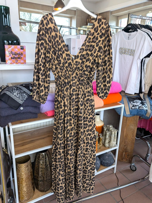 Dieses atemberaubende Maxi-Kleid in Leo-Print mit braunen und schwarzen Tönen verkörpert zeitlose Eleganz mit modernem Flair - unverwechselbarer Look!