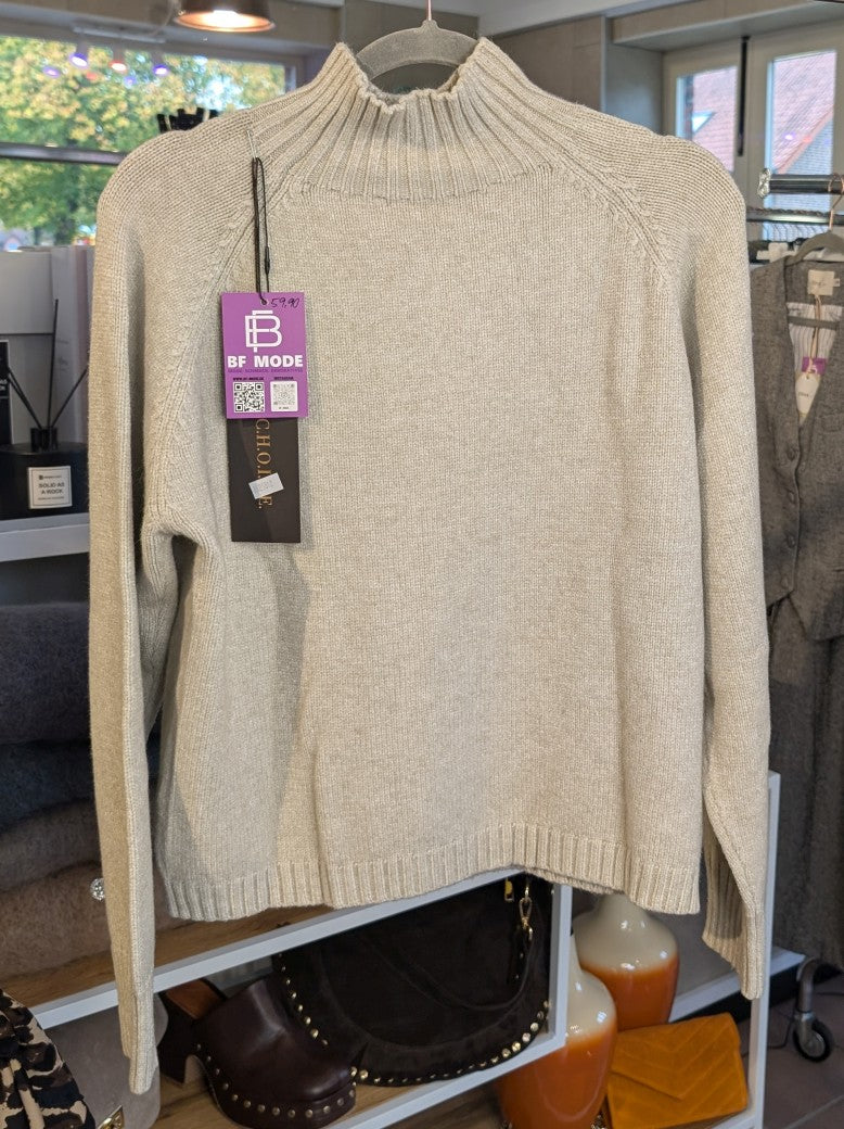 Der Pullover mit Rollkragen aus 41% Nylon und 31% Viskose in elegantem Beige verbindet Komfort mit stilvoller Vielseitigkeit - angenehme Wärme für kühle Tage!