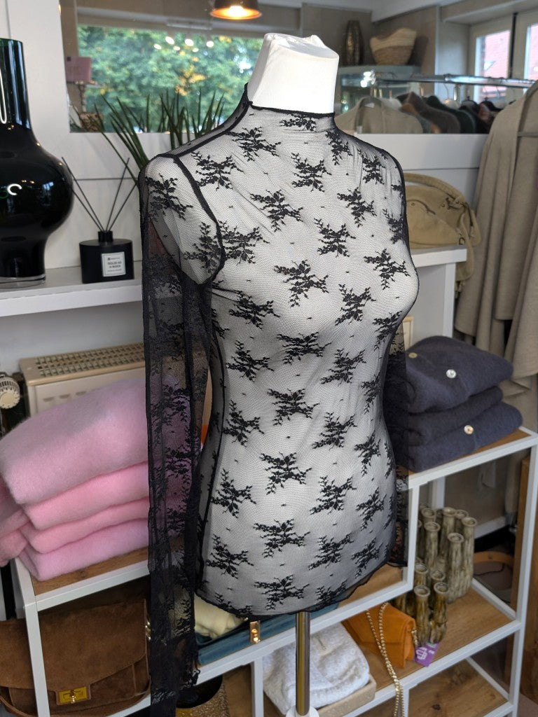 Elegantes Langarm-Shirt Schwarz mega Elastizität seidig weich, hochwertige Spitzenstoffmischung. Ideal für stilvolle Alltagskombinationen oder elegante Abende.