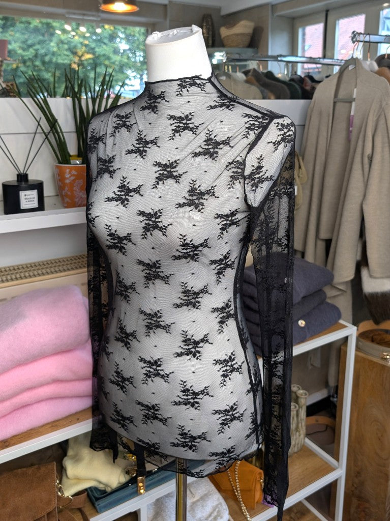 Elegantes Langarm-Shirt Schwarz mega Elastizität seidig weich, hochwertige Spitzenstoffmischung. Ideal für stilvolle Alltagskombinationen oder elegante Abende.