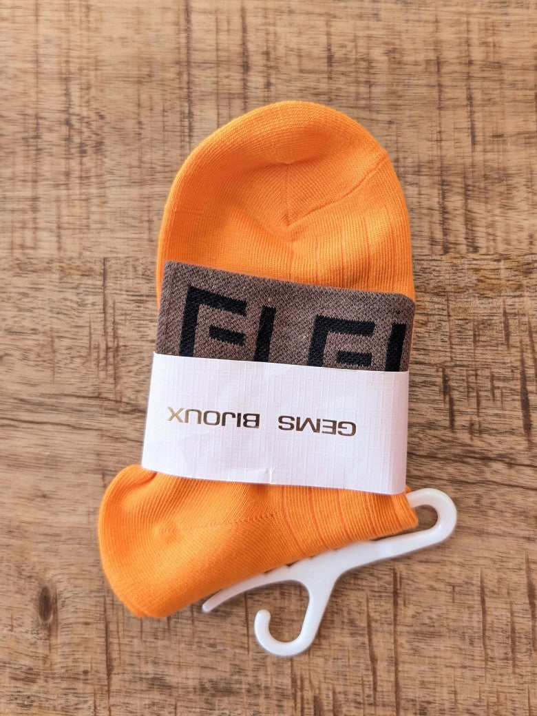 Erlebe unvergleichlichen Komfort mit Fendi Stil Socken in Orange mit Braun Schwarz aus Baumwolle mit perfekter Fußanpassung. Überzeuge Dich von Qualität & Stil!