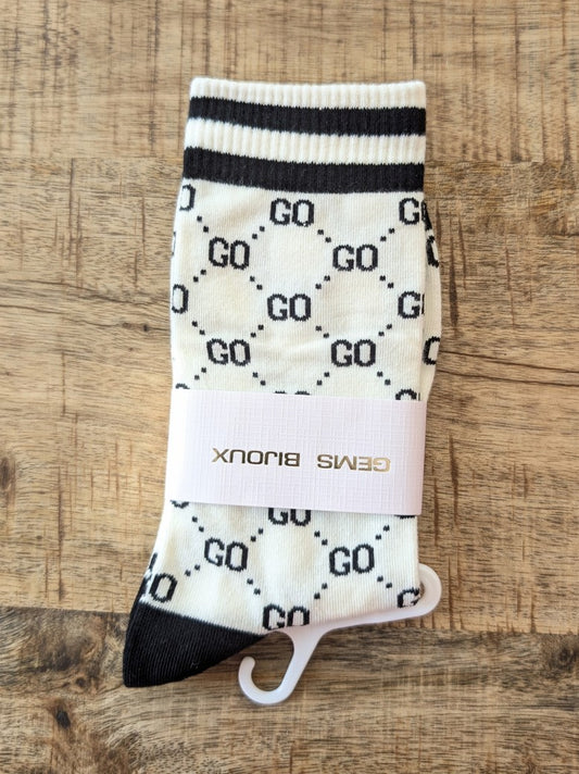 Erlebe unvergleichlichen Komfort mit unseren Gucci Style Socken in Weiß mit Schwarz aus Baumwolle mit perfekter Fußanpassung. Überzeuge Dich von Qualität & Stil!
