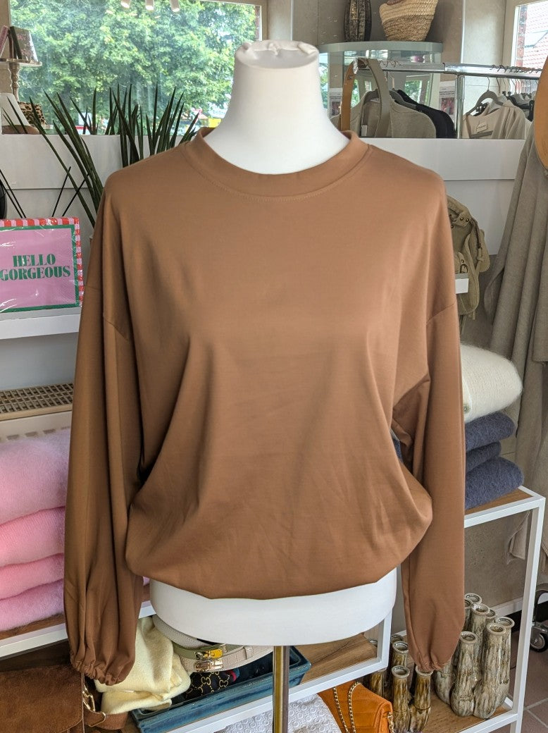 Gemütliches Cropped Langarm Shirt Sweatshirt aus weicher Viskose in elegantem Bronze Gold mit Gummizug am Saum.
