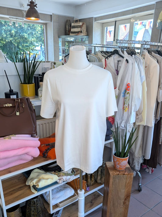 Das Basic T-Shirt aus hochwertiger Baumwolle in Créme bietet vielseitige Stylingmöglichkeiten - unverzichtbares Basic für casual oder elegante Looks!