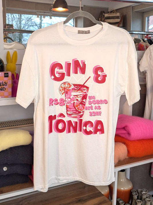 Setzen Sie ein modisches Statement mit diesem auffälligen Gin & Tonica T-Shirt in den lebendigen Farben Créme Rot Pink!