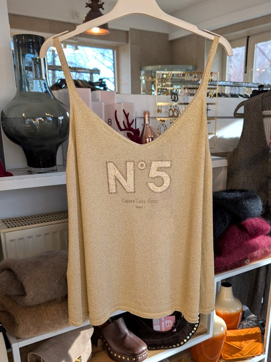 Elegantes Top im ikonischen Chanel-Stil mit glitzernder Viskose in warmem Beige für glamouröse Auftritte: Must-Have für klassische Eleganz mit modernem Glanz!